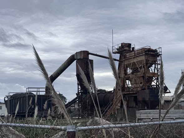 Weathered asphalt/hot plant tower and conveyor at Geo Aggregates