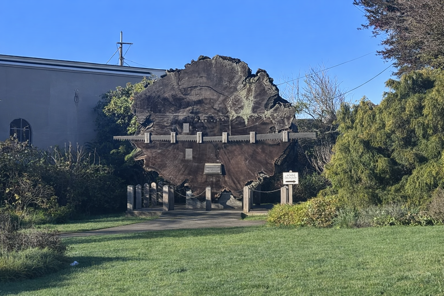 Historic redwood log slice landmark in Fort Bragg